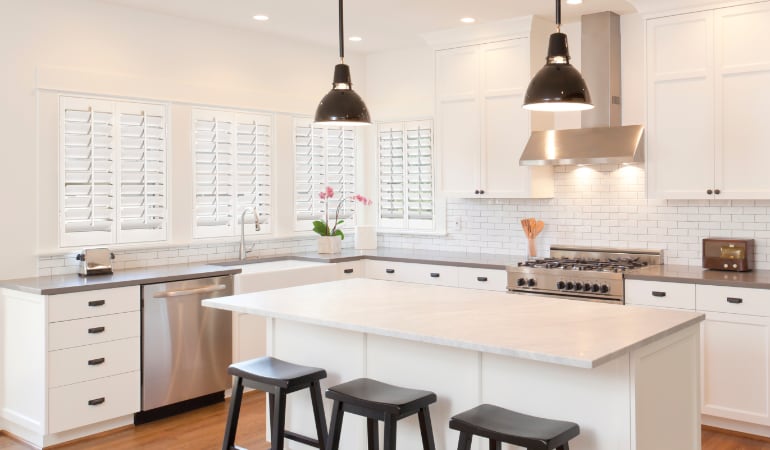 Plantation shutters in a bright New Brunswick kitchen.